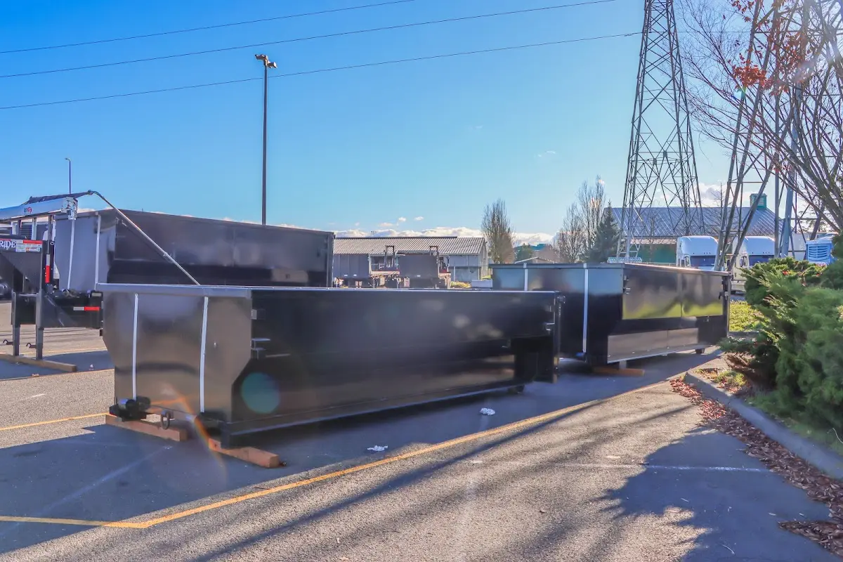 Roll-off dumpster ready for waste disposal at job site for 15 Yard Dumpster Rental in Marble Falls